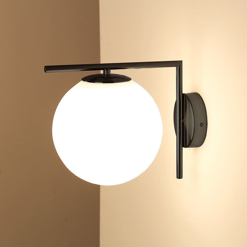 zidne lampe za dnevni boravak crne boje prikazne kako svjetle prema dolje